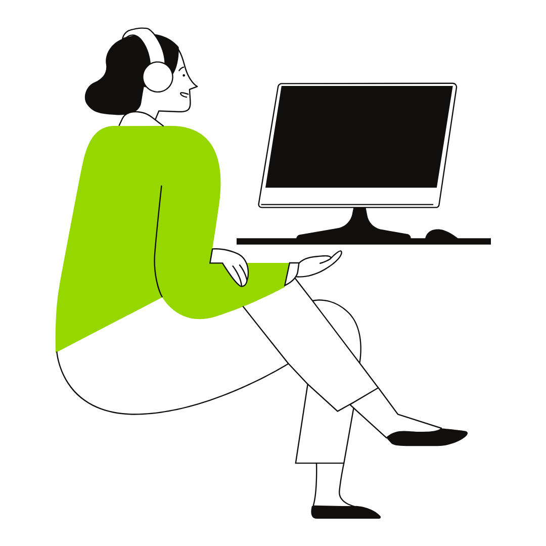 woman on computer wearing headphones